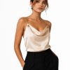 Lumière Satin Top features a fluid satin finish and elegant draped neckline, creating a timeless blouse for sophisticated day-to-evening styling.