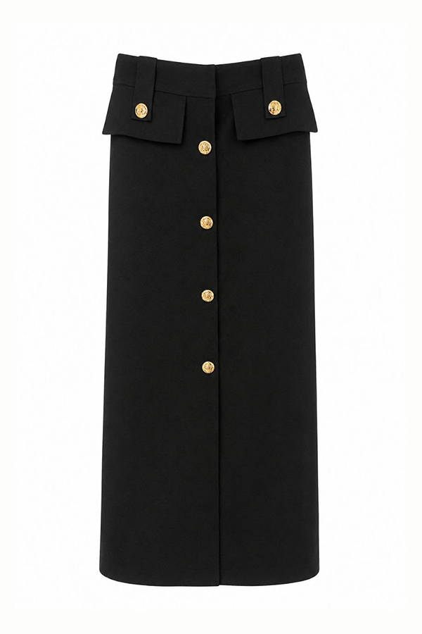 Auréline Skirt features structured pleats, elegant gold-button details, and a refined mini silhouette designed for sophisticated contemporary styling.