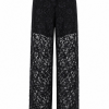 Noémie Lace Trousers feature elegant floral lace panels, a wide-leg silhouette, and refined tailoring for luxury occasion dressing and modern sophistication.