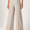 Premium wide-leg trousers featuring crossover waist and sharp front creases