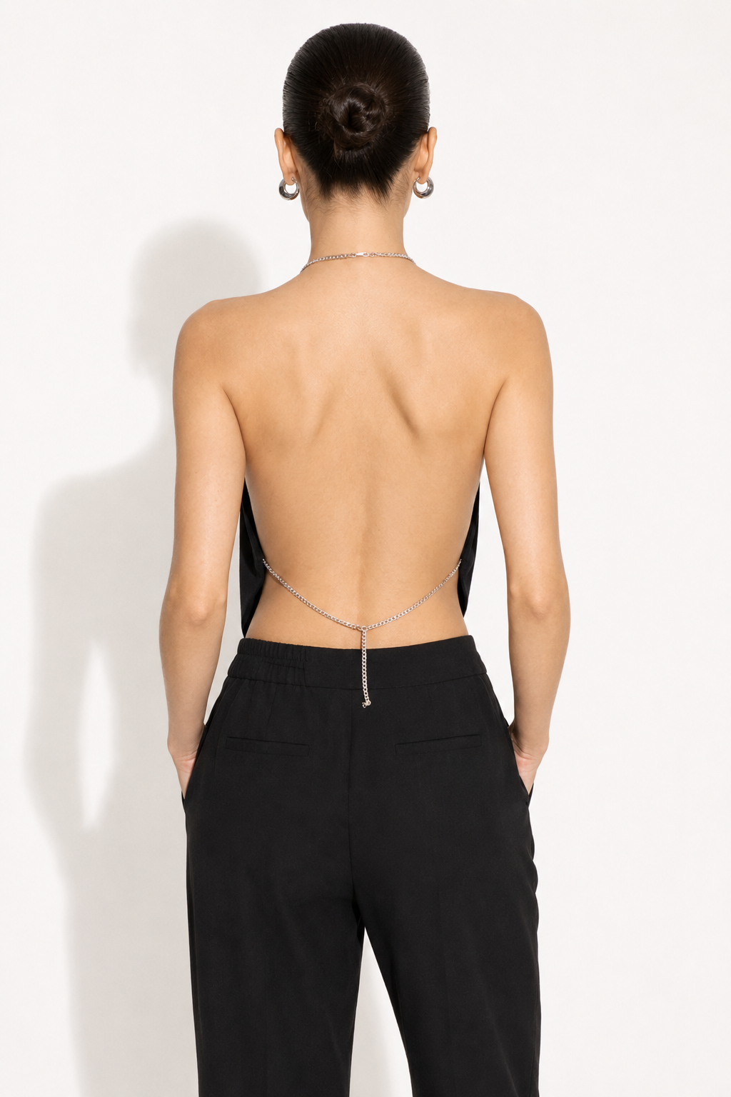 Premium black draped crop top with chain shoulder straps