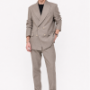 Alaric Double-Breasted Suit Male model wearing the Alaric Double-Breasted Suit with black sunglasses and leather shoes