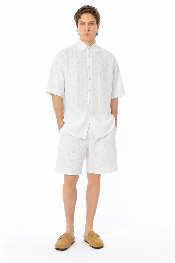 Discover the Elian Textured Shirt and Shorts Set, a luxury men’s summer outfit featuring a lightweight textured fabric, geometric woven pattern, and refined relaxed fit for effortless style.