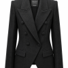 Luxury black double-breasted tailored blazer with covered buttons and peaked lapels.
