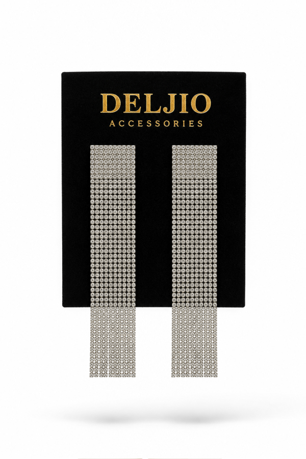 Lumera Crystal Fringe Earrings displayed on black velvet DELJIO card