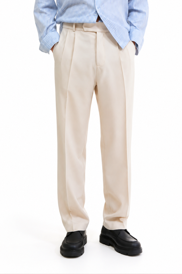 The Regent Pleated Trousers feature premium Cartier cotton, refined front pleats and a relaxed tailored fit. Style them with The Regent Blazer.