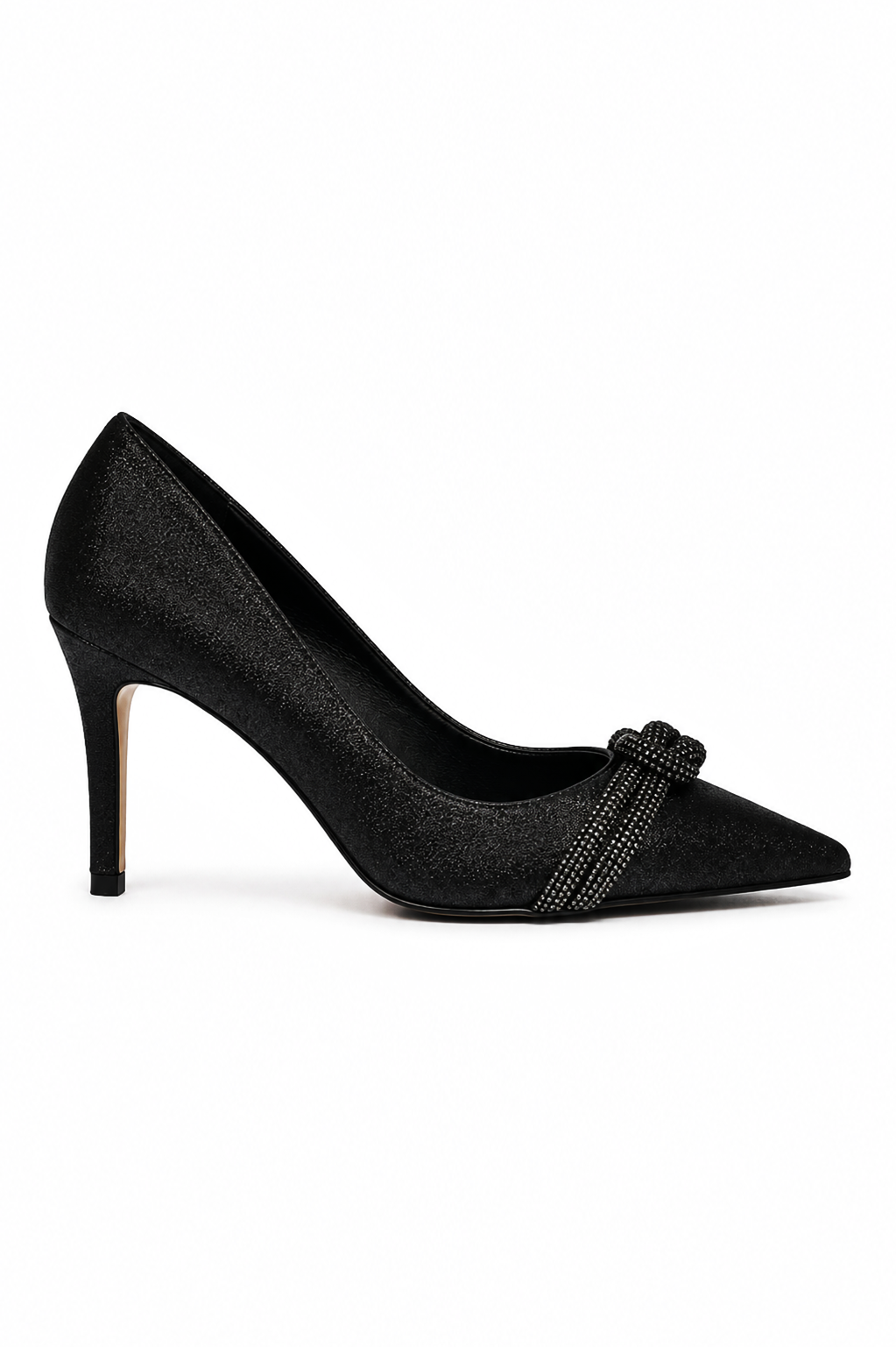 Velmora embellished pumps styled with a long black slit dress