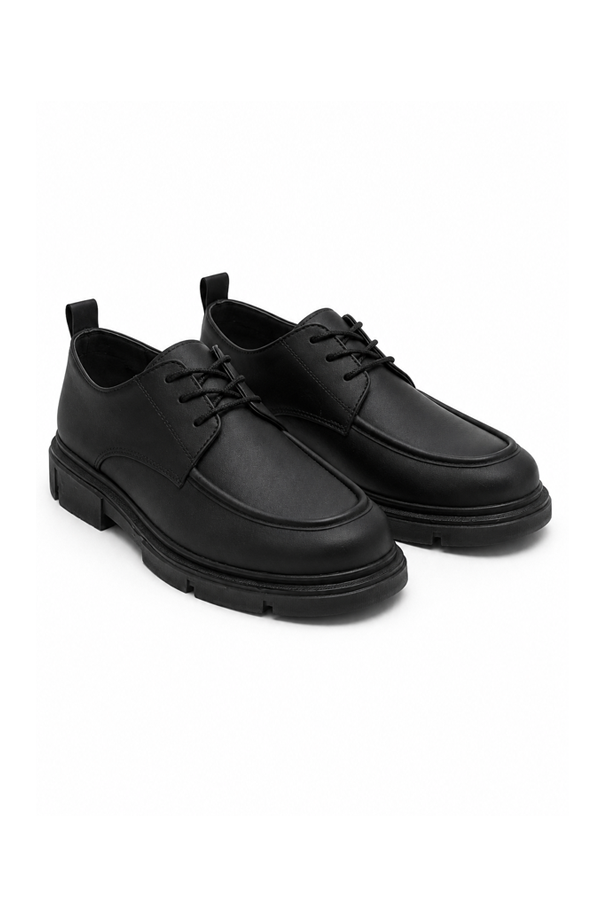 Side profile of Valen Black Chunky Derby Shoes showing the layered lug sole